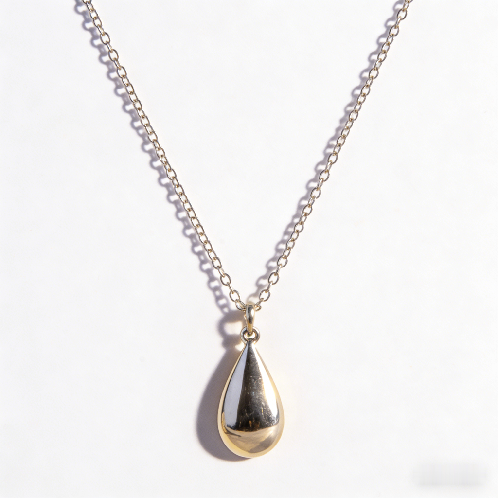 ☯️ "Two-Tone Teardrop Pendant Necklace" – Split Design | Silver & Gold Plated | Modern & Balanced Style 🤍